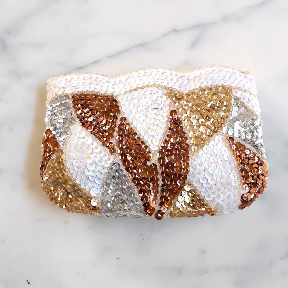 NWOT. Handmade evening bag purse with multi color design.